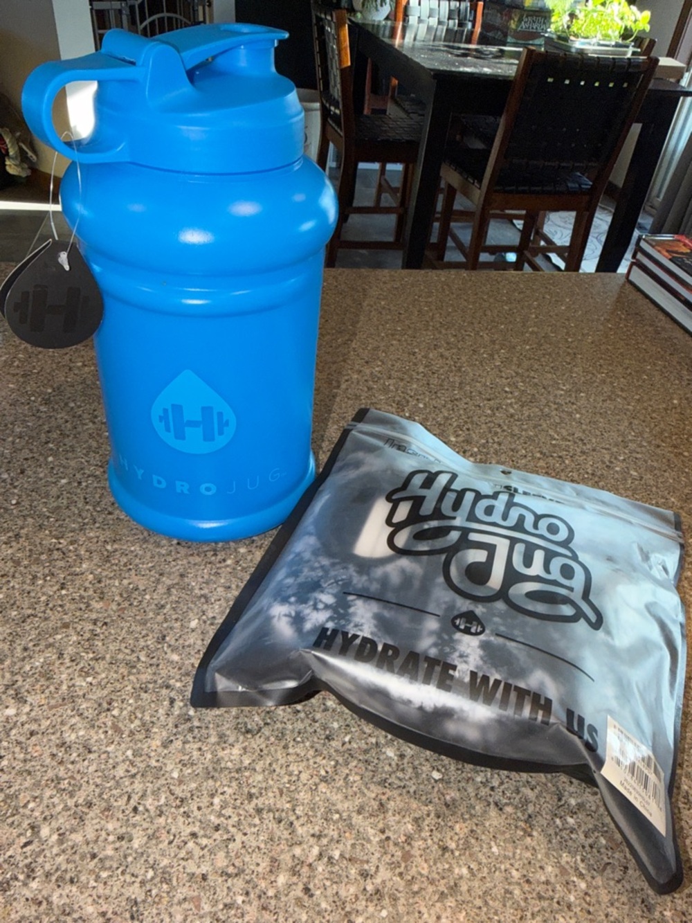 HydroJug Vibrant Blue Sports Water Jug with insulated sleeve